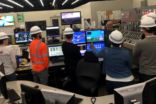 Nelson Plant Control Room Operator Ralph Midkiff shows students the control room and explains operators' daily job duties and responsibilities.
